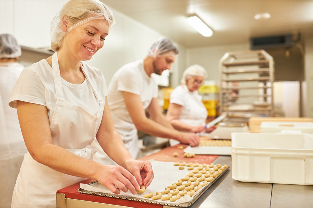 AdobeStock_BakeryStaffMakingCookies.jpg